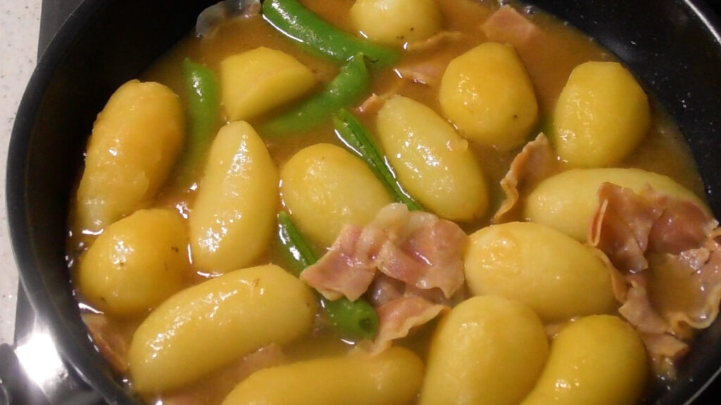 Simmer new potatoes in a slow cooker